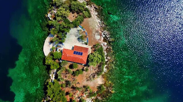Agios Nikolaos islet on the Delphi Riviera, Greece
