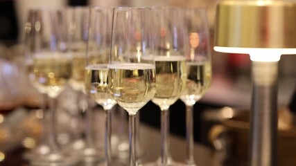 Luxurious reception with shining wine glasses and cozy ambiance