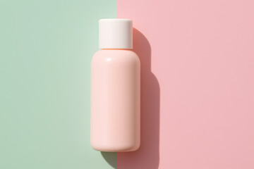 A pink bottle with a white cap on a pastel background