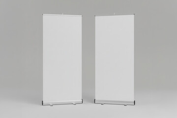 Two blank roll-up banner mockups on gray background
