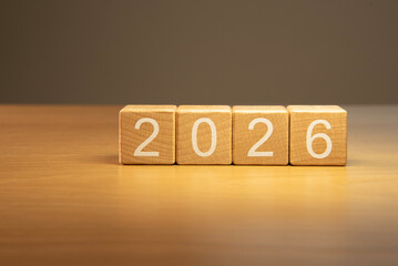 Craft wooden cube blocks 2026. Numbers on wooden blocks with copy space. 2026 happy new year idea concept.
