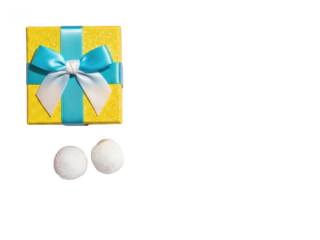 Yellow gift box with blue ribbon and two white balls isolated on transparent background