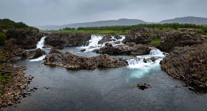 drone panorama of the idyllic Glanni Waterfall in West Iceland
