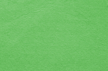 Green felt fabric background texture.