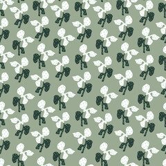 Hand drawn leaves and dots on mint background. Vector illustration with leaves white and dark green colors