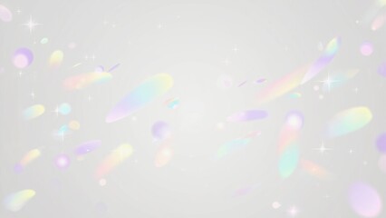 Colorful light patterns create a vibrant display against a plain background during an art event