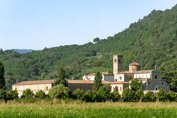 View of Benedictine monastery and convent Abbazia di Praglia in Padua, Italy as a Christianity, religion, and Catholicism concept with green summer landscape
