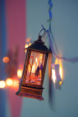 Christmas decorations, lanterns and glowing garlands with balls
