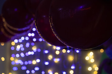 Christmas decorations, lanterns and glowing garlands with balls