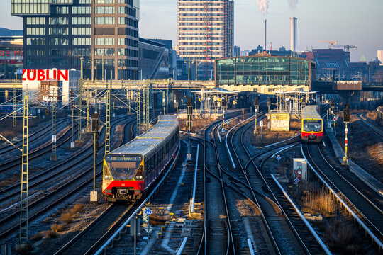 Berlin, Germany - December 26, 2025: S-Bahn trains on multiple railway tracks seen from Warschauer Strasse bridge