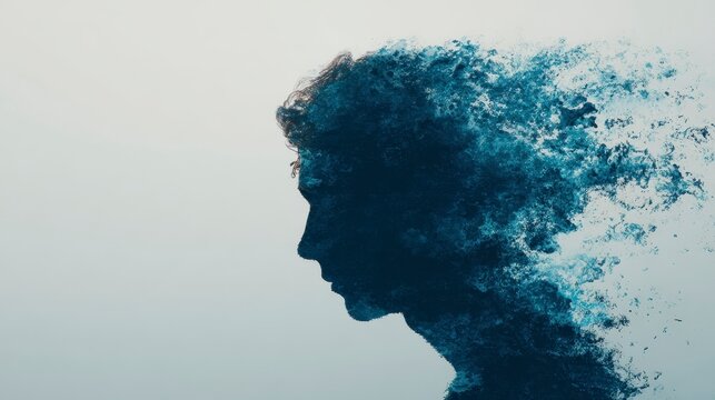 A silhouette of a human profile dissolving into small particles, conveying a sense of change and mental disintegration