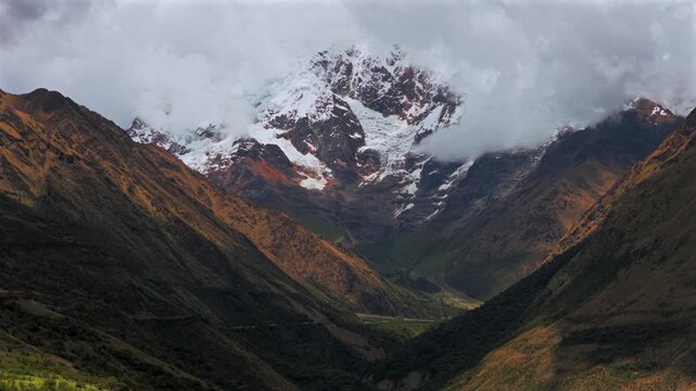 Mount Humantay Salkantay trail Peru aerial drone high altitude Peruvian Andes snow capped glacier peaks Laguna Humantay Lake dry season sunny blue sky morning Anta province forward upwards parallax