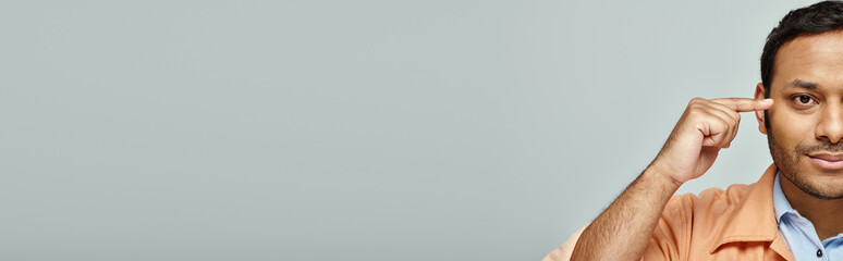 Engaging expression of a handsome Indian man showcasing thoughtful insight and emotion