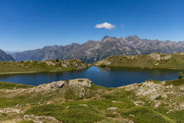 Scenic Lake Besson in the French Alps, located northeast of Alpe d&rsquo;Huez in the Grandes Rousses massif