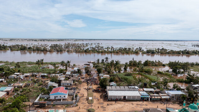 Aerial view of floodwaters engulfing homes and streets, a stark reminder of nature's power in Sofala Province, Mozambique.