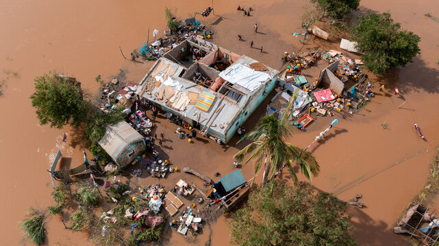 Aerial view of homes submerged in muddy floodwaters after heavy rainfall, Buzi, Sofala Province, Mozambique.