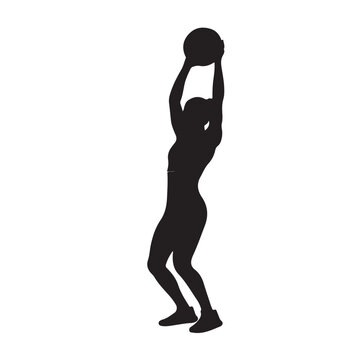Black silhouette of a woman throwing a medicine ball exercise fitness