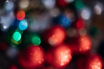 Photos with blurred lights of New Year's balls, creating a bright and festive atmosphere.