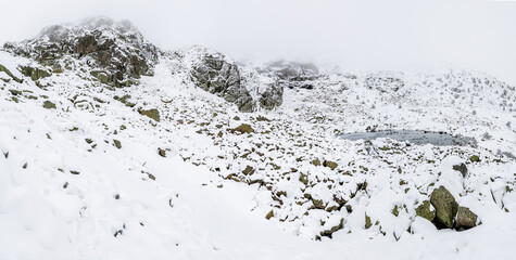 The Sierra de Guadarrama mountains in Madrid during the snowfall of december 2025, at the Cotos mountain pass