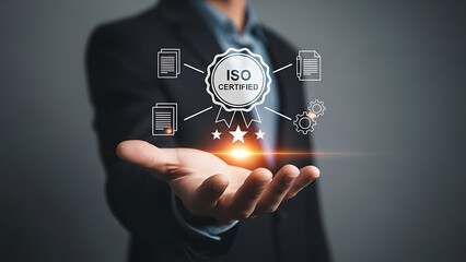 Businessperson holding a glowing digital interface representing futuristic technology and data security concepts