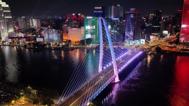 Aerial view of Ba Son Bridge at night in downtown Ho Chi Minh City, connecting District 1 and Thu Duc district