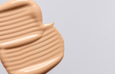 Skin foundation or makeup base. Cosmetic product.