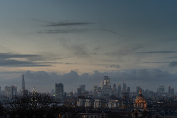 Skyline view at dusk with city lights
