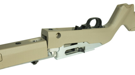 Rear of a riflestock being reinstalled on the receiver