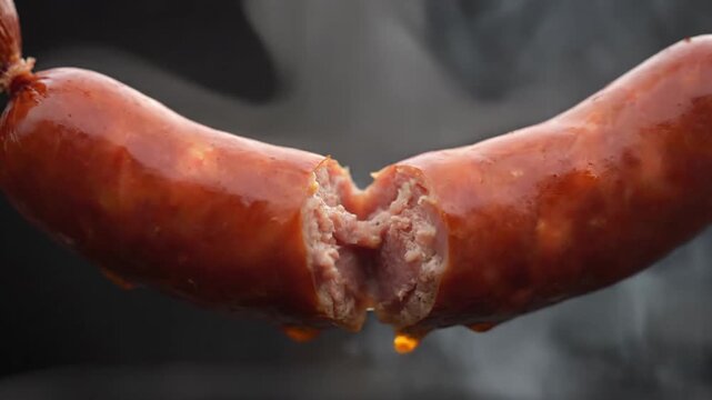 Hot Smoked Sausage Cut Open Dripping Grease Close-up Slow Motion