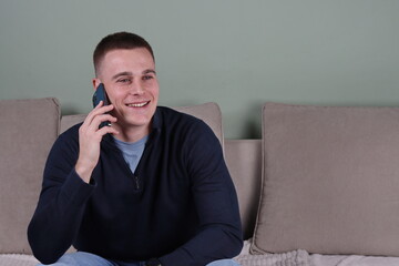 young happy businessman talking on phone, smiling white man on his mobile phone