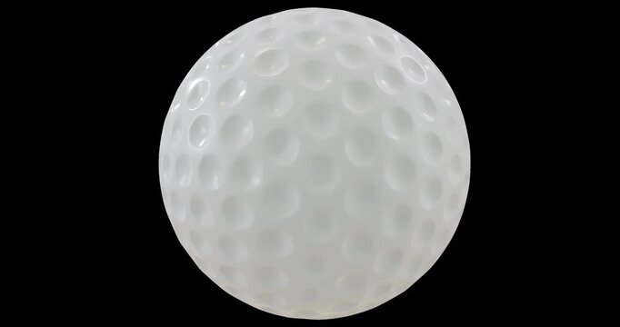 Seamless looping Britain golf ball with hexagonal dimples isolated vertical axis rotation footage with alpha channel (Prores, 4K).  Studio light. 3D FX animation.
