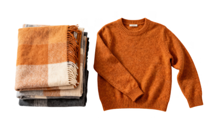 Overhead view of a warm sweater paired with layered blankets arranged flat on white symbolizing nonmedicinal cold protection essentials.