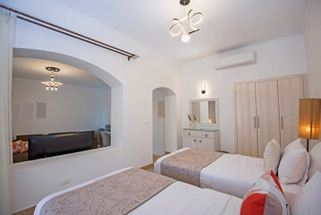 Interior design of twin bedroom in luxury house