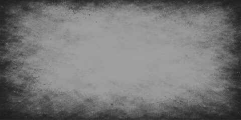 Obraz premium Aged vintage grunge paper texture with a dark gray old concrete wall pattern and a rough textured dirty stone surface design for a blank gray background