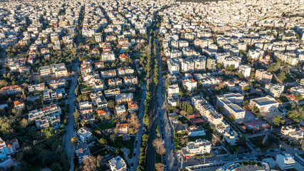 Drone photo of apartment buildings and overground metro line in Marousi suburb of Athens, Greece