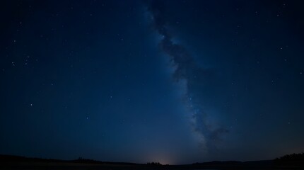 Fototapeta premium Milky Way and Night Sky Above Dark Horizon