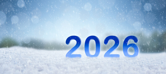 against the background of winter snow, the numbers 2026 stand on the snow. new 2026 year, christmas
