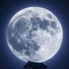 푸른 하늘에 뜬 하얀 보름달과 그 아래 한국기와집A white full moon in the blue sky and a Korean flag house below it