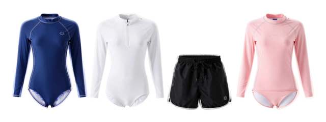 Photograph of three long-sleeve swim leotards and black swim shorts. From left to right: blue leotard, white leotard, black shorts, pink leotard.
