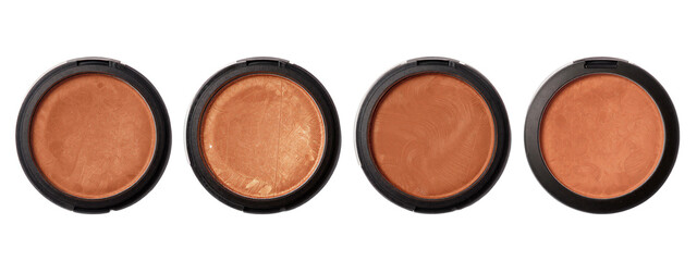 Four circular, black-cased eyeshadows with varying shades of warm brown and copper, arranged horizontally.