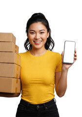 Young asian woman (24) in a bright yellow t-shirt, excitedly holding brown parcel boxes and a thin-bezel smartphone mockup with a blank screen, against a seamless transparent high-key studio