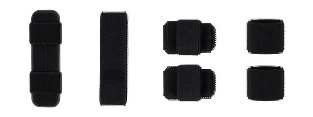 Photograph of five black, rectangular, textured foam pieces arranged horizontally. Pieces vary in size and have rounded edges.