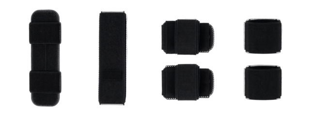 Photograph of five black, rectangular, textured foam pieces arranged horizontally. Pieces vary in size and have rounded edges.
