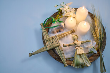 Imbolc brigid's cross, corn dollies, sheep, ritual candles