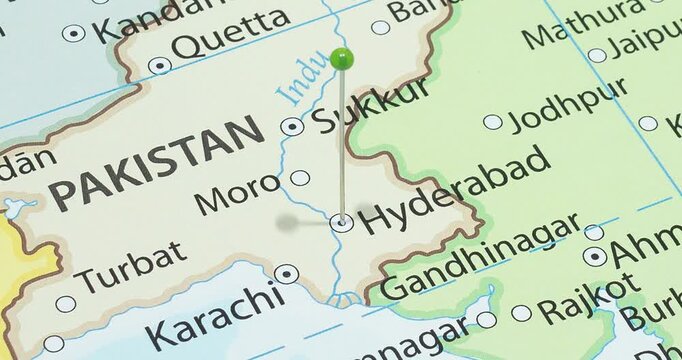 A zoom out of a green pin into hyderabad city of pakistan political map