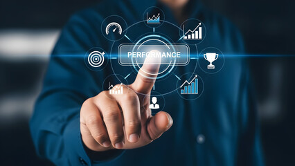 Businessman analyzing performance metrics with futuristic interface