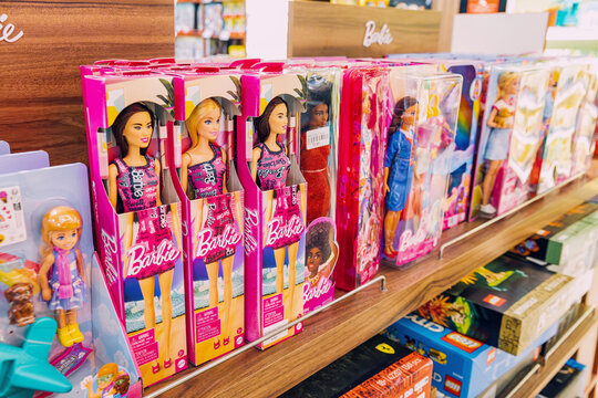7 November 2025, Tbilisi, Georgia: Barbie Fashion dolls featuring diverse looks lining the shelves of a toy store, highlighting childhood play