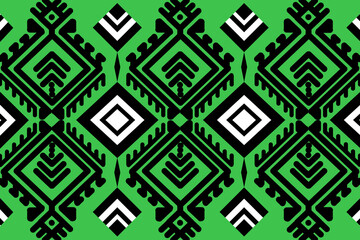 Seamless tribal geometric pattern, green background, black and white diamond motifs, ethnic textile, flat vector.
