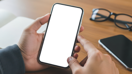 Person using a modern smartphone with a blank screen, perfect for displaying digital content