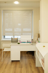 a pediatrician's office with everything necessary for an appointment